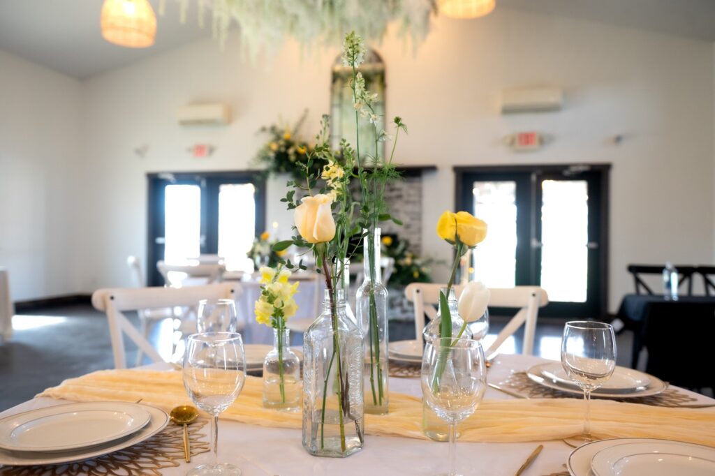 Estate al vigneto: a wedding designed with intention, not just inspiration 2 Table setting with florals from Estate Al Vigneto planned by Cypress and Sage Event and Design